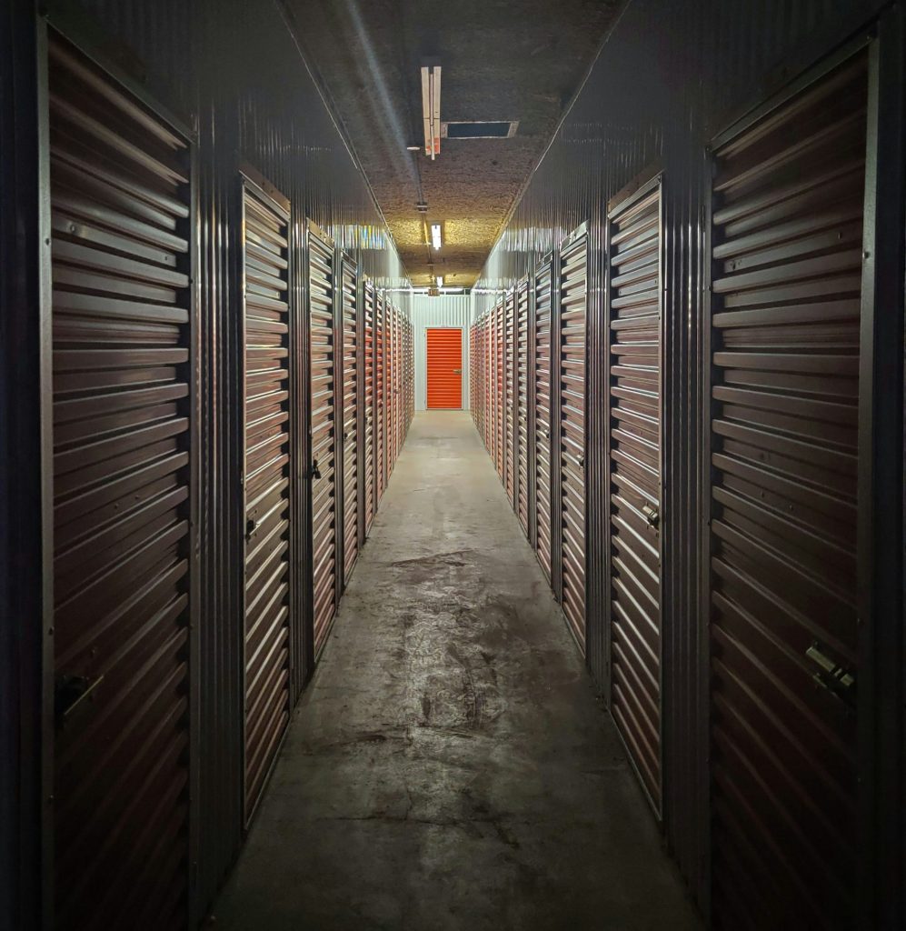 empty hallway with lights turned on in the middle